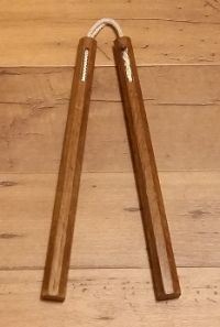 Nunchaku, with nylon-rope linkage.